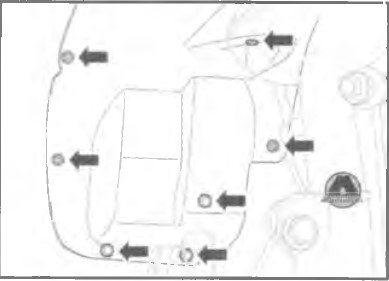Викрутити гвинти кріплення та від'єднати фіксуючі затискачі передньої частини підкрилка колісної арки