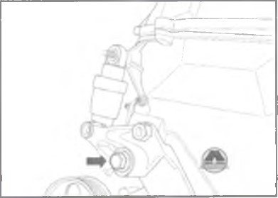 Викрутити болт кріплення кронштейна ролика натягувача ременя приводу навісного обладнання